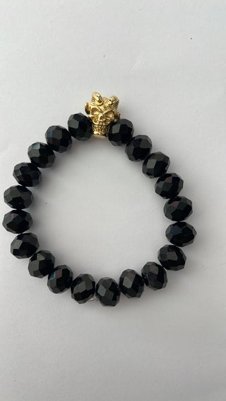 Angelito Negro – Pulsera cabra calavera negra y dorada