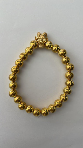 Angelito Negro – Pulsera dorada calavera cabra