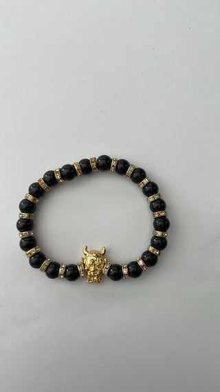 Angelito Negro – Pulsera negra brillantes diablo dorado